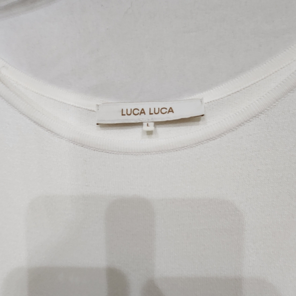 Luca Luca beautiful white sleeveless light-weight sweater material,  Size L